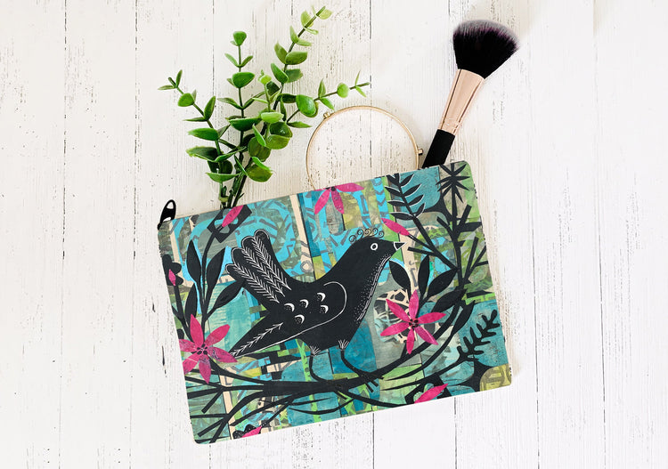 pouch with colorful bird themed art