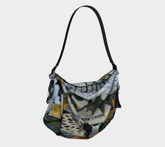 Multicolored patterned handbag on a light gray background