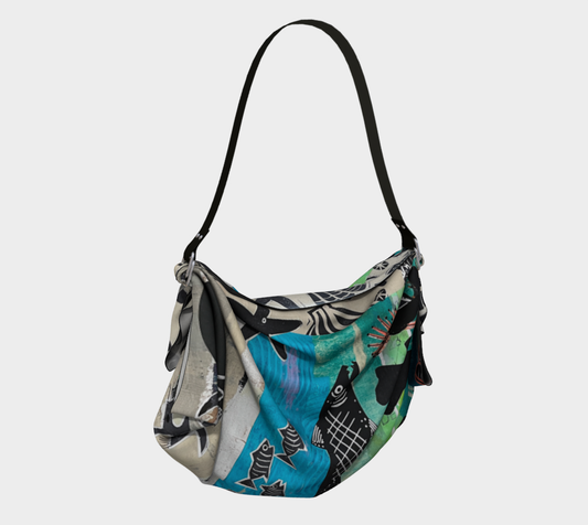 Multicolored patterned handbag on a light gray background