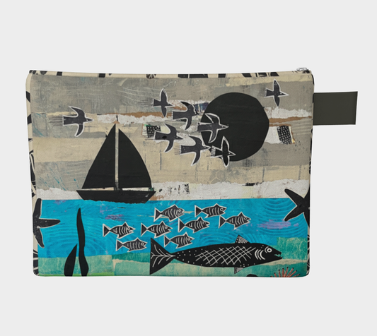 Pouch with sailboat and fish design on a textured background