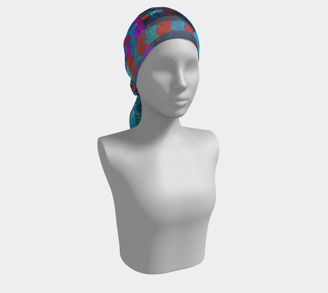Colorful headscarf on a mannequin against a white background