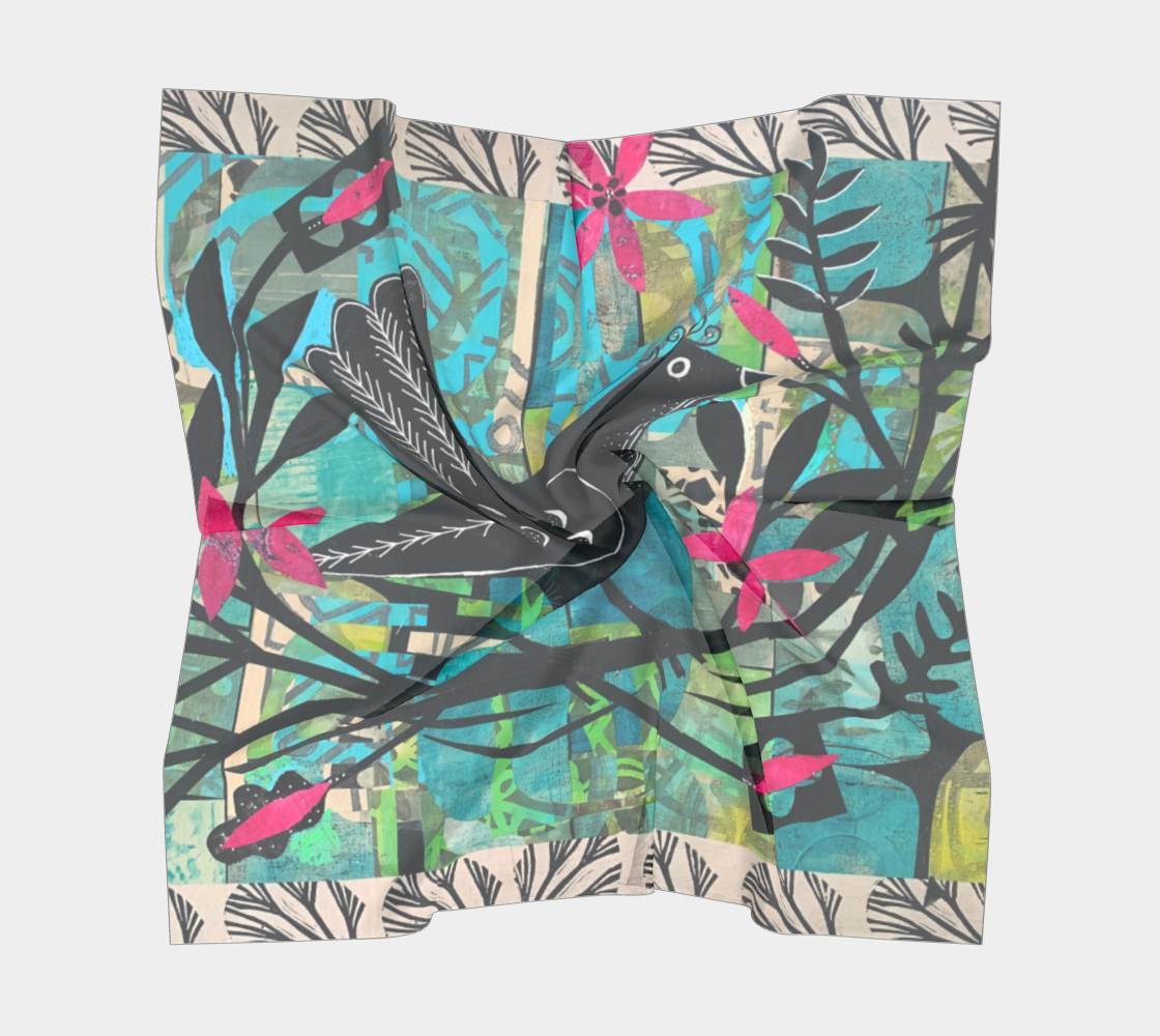 Colorful scarf with bird and leaf pattern on a white background