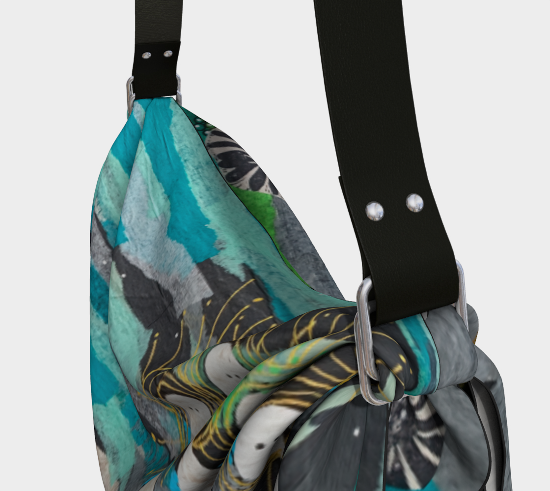 Multicolored patterned bag with black straps on a light gray background