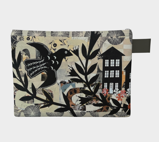 Pouch with a black bird and house design on a beige background