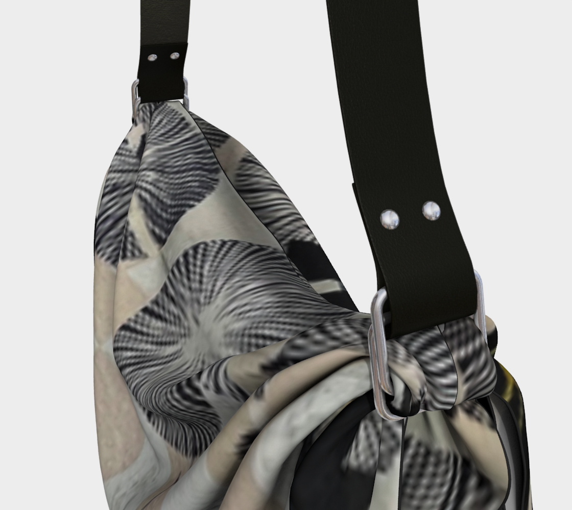 Patterned bag with a black strap on a light gray background