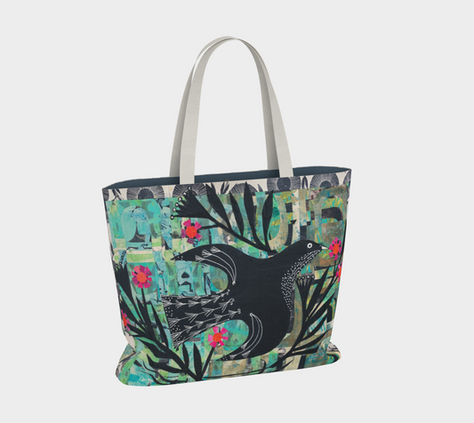 Tote bag with a bird and floral design on a white background