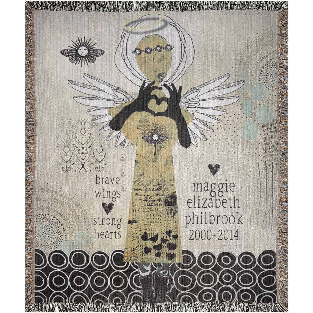 Decorative blanket with angel design and text on a neutral background