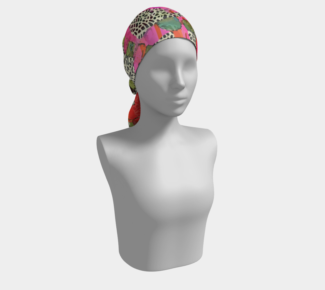 Colorful patterned headscarf on a mannequin against a white background