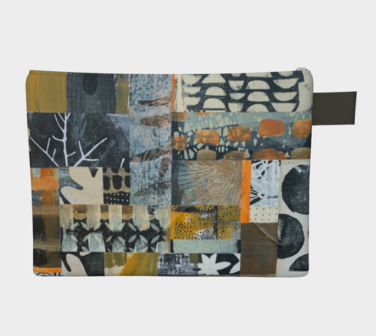 Patchwork pouch with abstract patterns on a white background