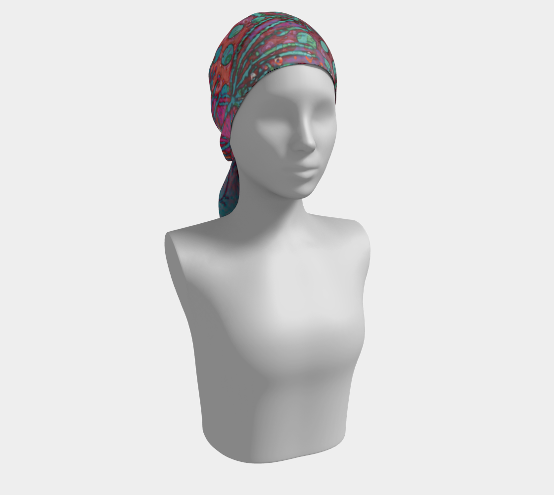 Colorful headscarf on a mannequin against a white background