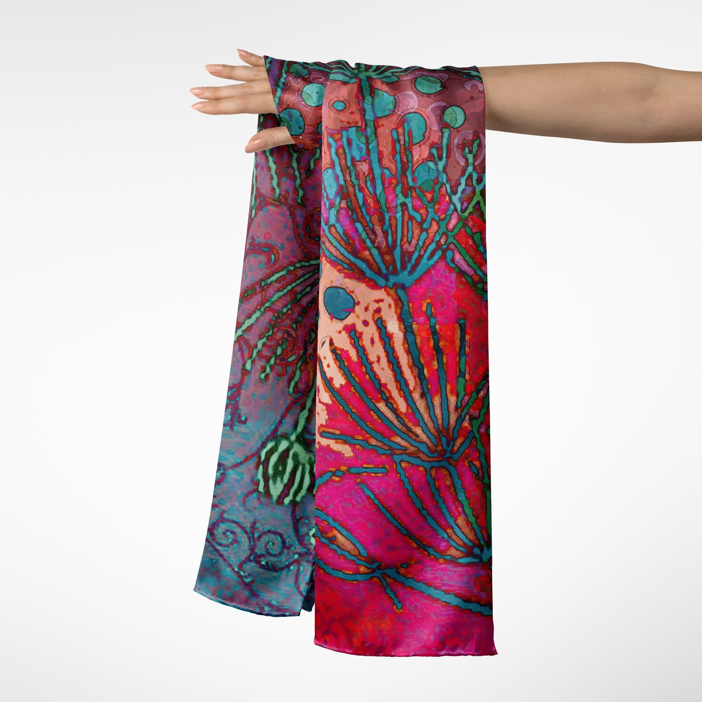 Colorful scarf with abstract design held by a person on a white background