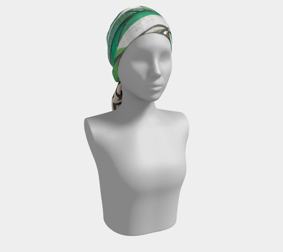 Mannequin head wearing a green and white patterned headscarf on a light gray background