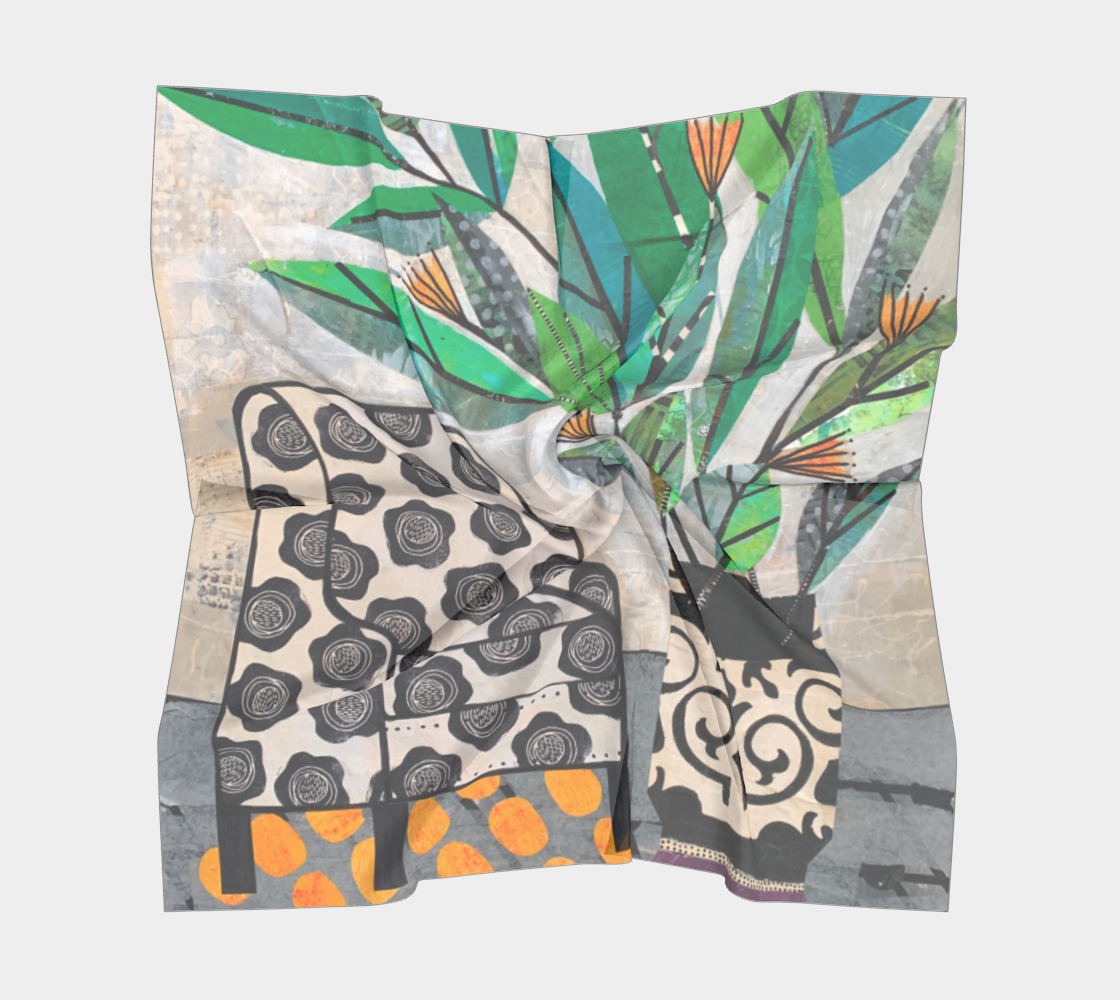 Folded fabric with a colorful pattern on a white background