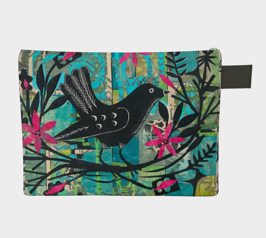 Fabric pouch with bird and floral design on a white background