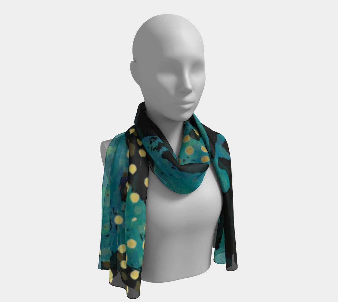 Mannequin wearing a teal scarf with black and yellow polka dots on a white background