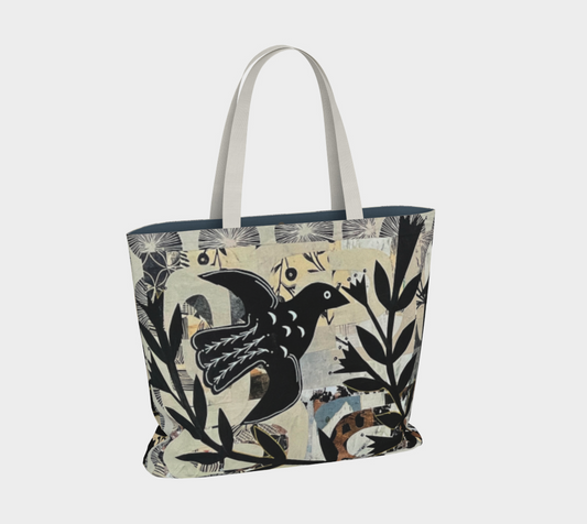 Tote bag with bird and leaf pattern on a light background
