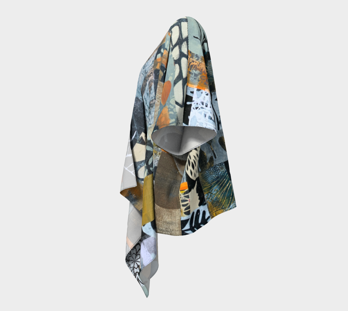 Colorful patterned fabric draped over a human form on a light gray background