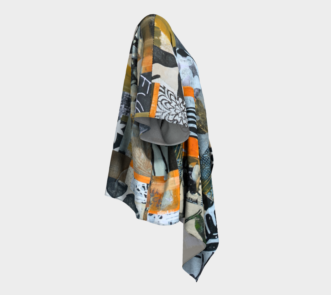 Colorful patterned scarf draped over a white background