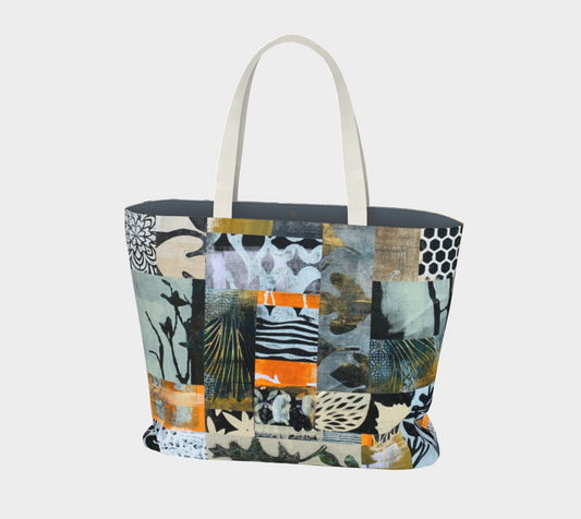 Tote bag with a colorful patchwork design on a light gray background