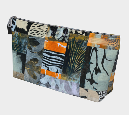 Patchwork-style pouch with a mix of patterns on a white background