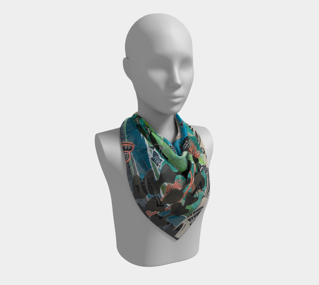 Mannequin wearing a colorful scarf on a white background