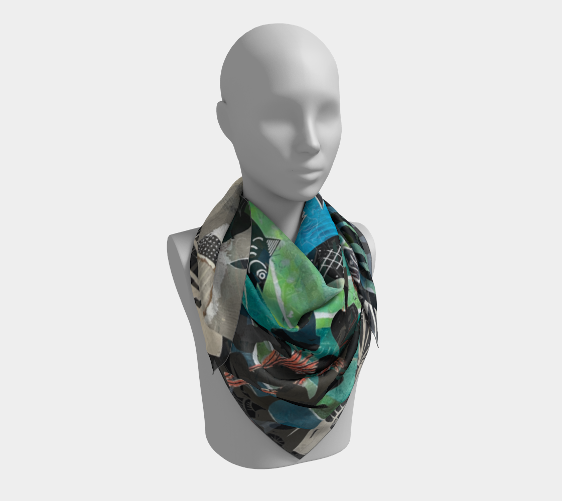 Mannequin wearing a colorful patterned scarf on a white background