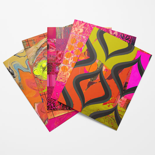 Set of colorful notebooks with abstract designs on a white background