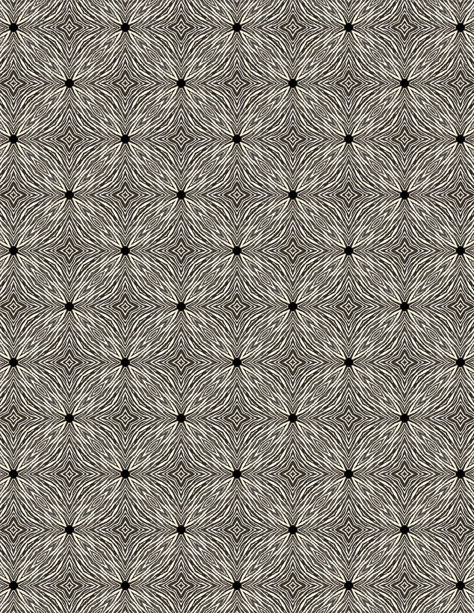 A seamless geometric pattern featuring repeating starburst motifs in black, gray, and off-white, arranged in a grid.