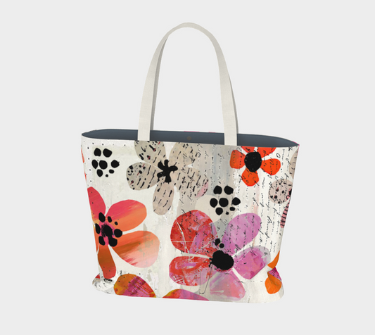 Tote bag with colorful floral pattern on a white background