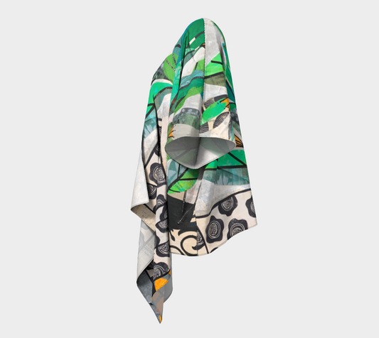 Decorative scarf with green and black pattern on a white background