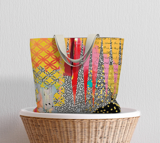 Colorful tote bag with abstract patterns on a white surface