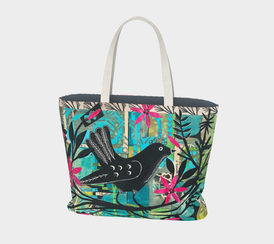 Tote bag with bird and floral pattern on a white background