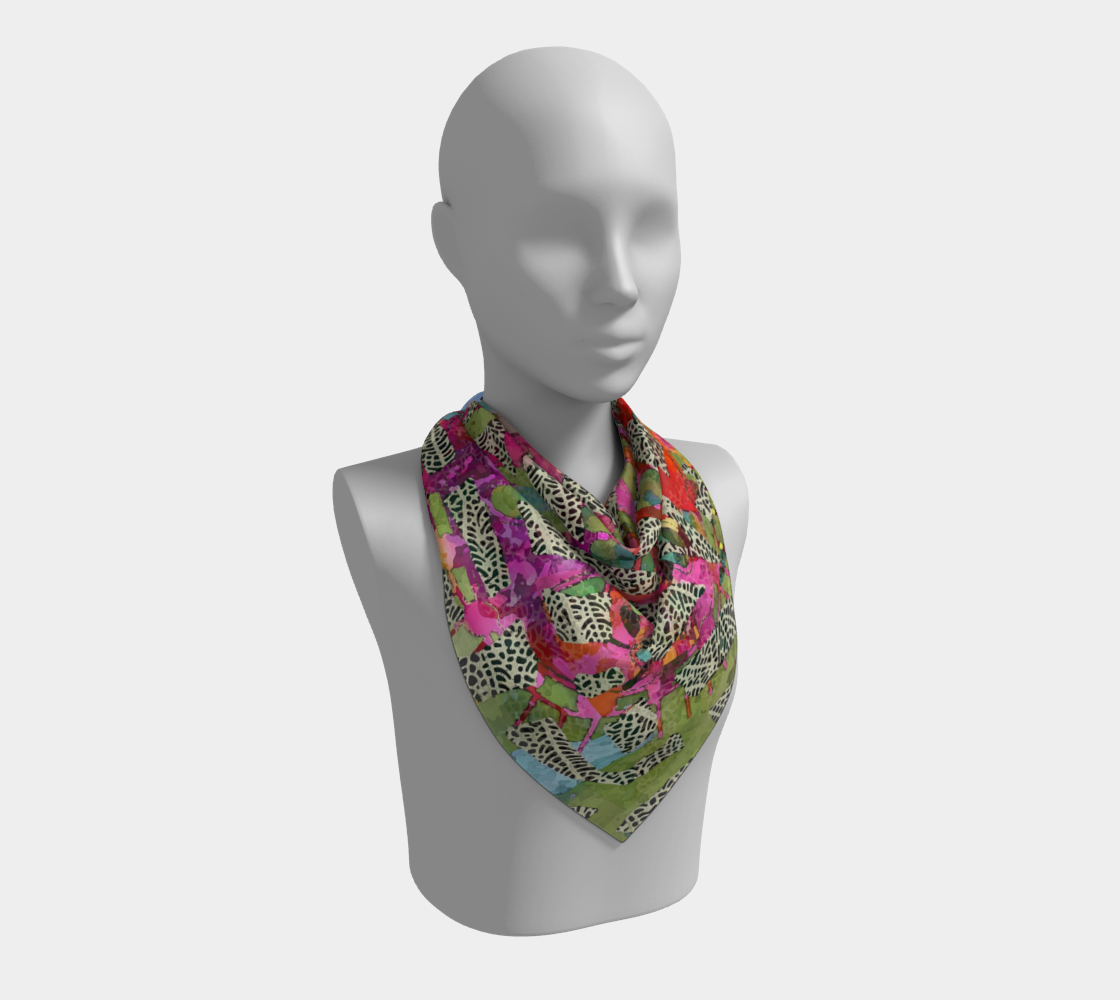 Mannequin wearing a colorful patterned scarf on a white background