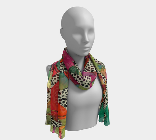 Mannequin wearing a colorful patterned scarf on a white background