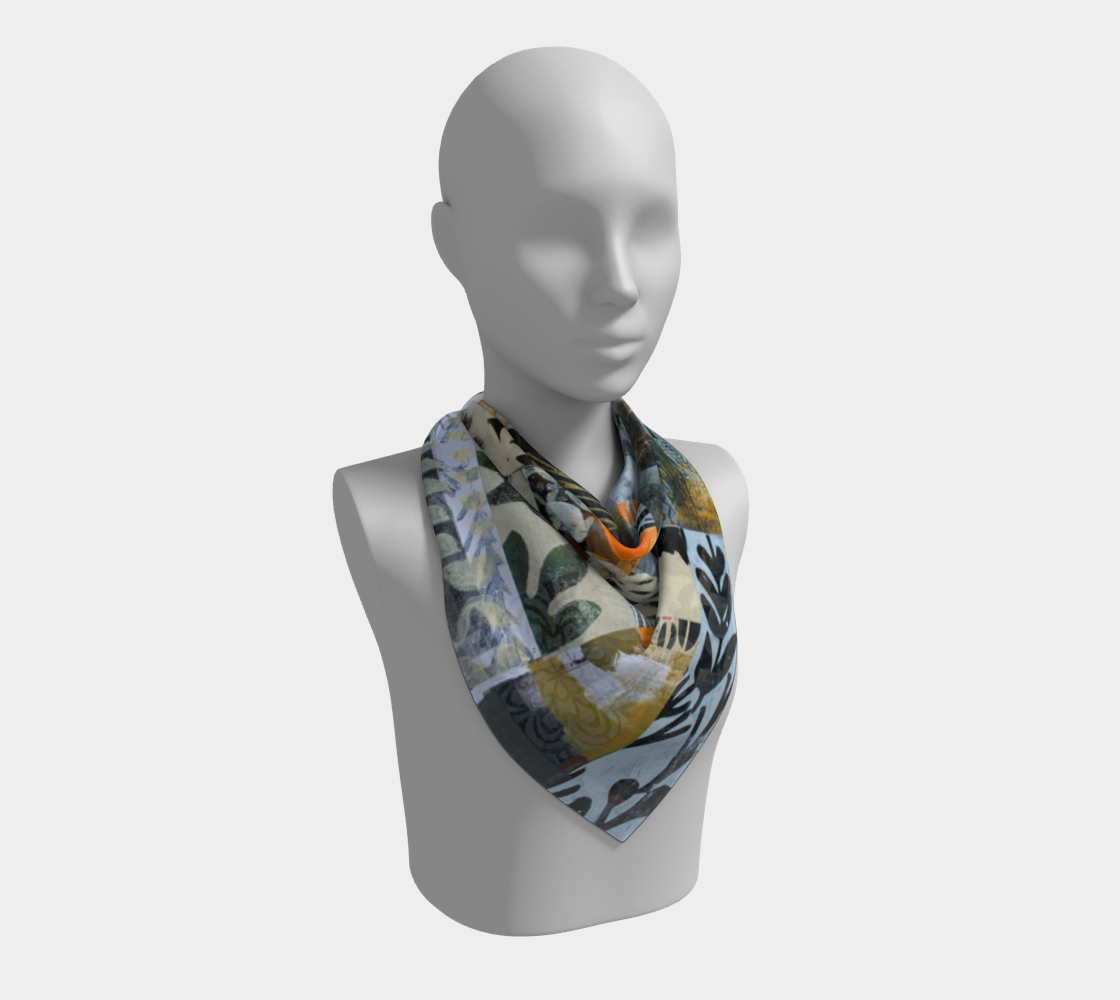 Mannequin wearing a patterned scarf on a white background