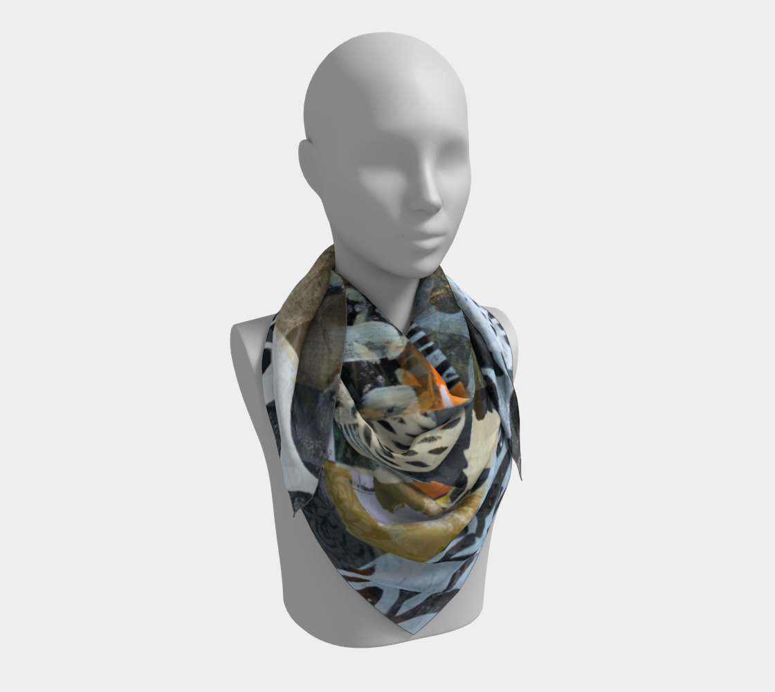 Mannequin wearing a colorful patterned scarf on a white background