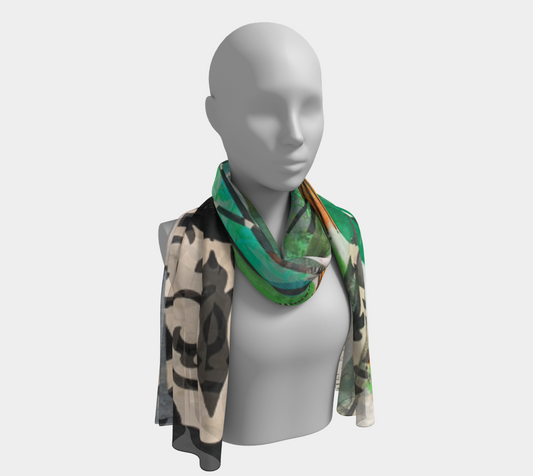 Mannequin wearing a colorful scarf with a camouflage pattern on a white background
