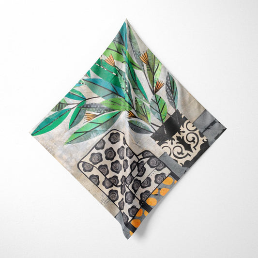 Multicolored patterned fabric square on a white background