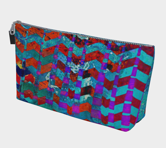Colorful geometric patterned pouch on a white background