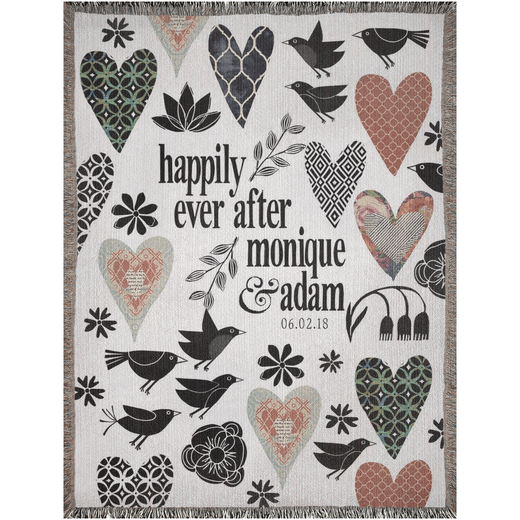 Decorative blanket with heart, bird, and floral patterns featuring text 'happily ever after monique & adam 06.02.18'.