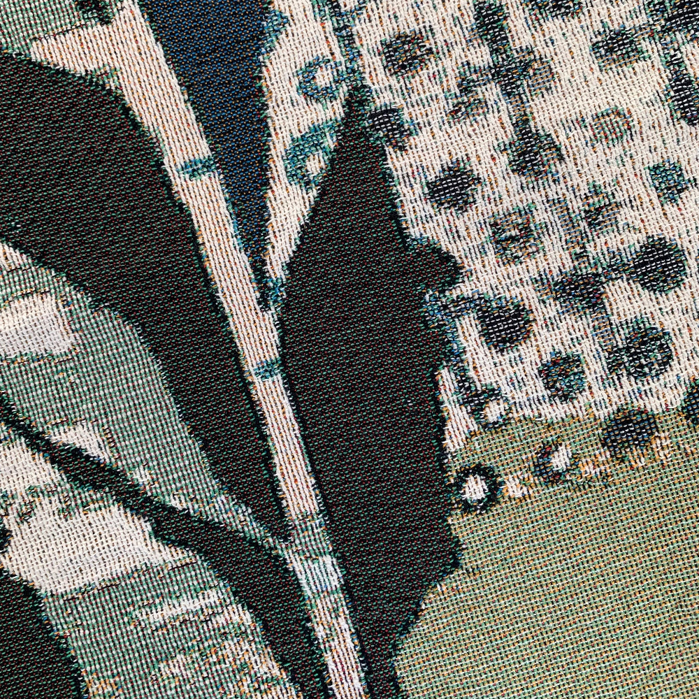Close-up of a textured fabric with leaf pattern