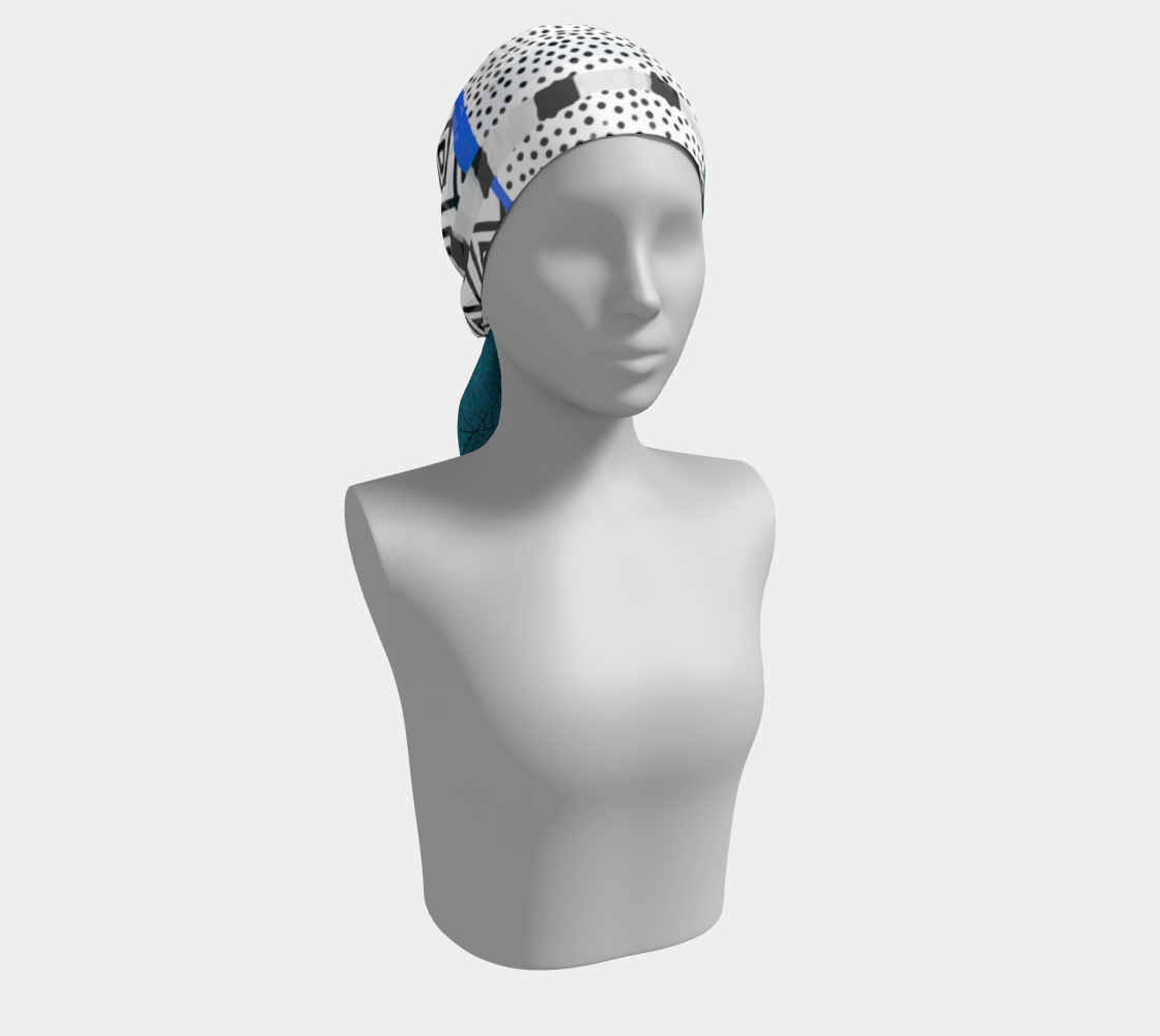Mannequin head wearing a patterned headscarf on a white background