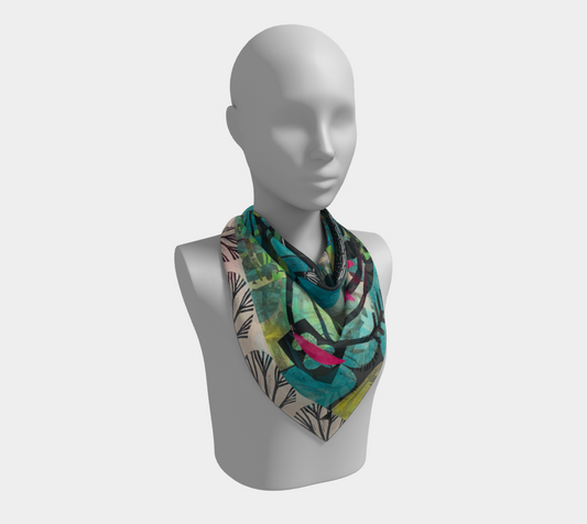 Mannequin wearing a colorful scarf on a white background